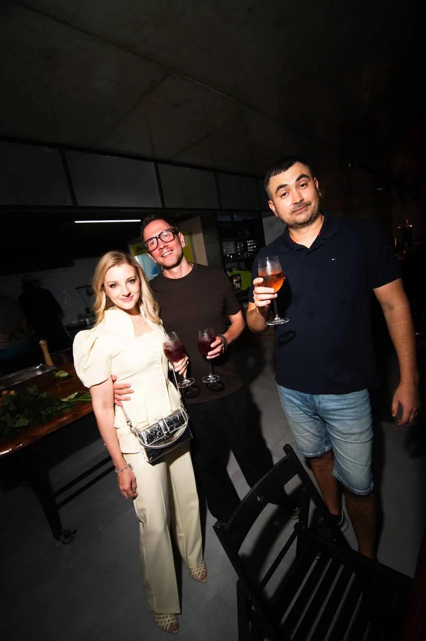 Guests with drinks at the LEVEL Beach Batumi bar on New Boulevard